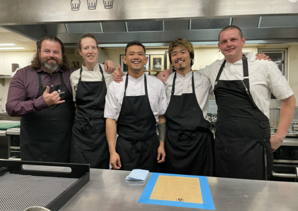 Executive Chef Vaughan Mabee (far left) and four chefs dragged in to work on their day off for one lucky food critic