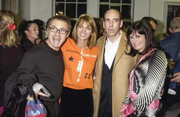 Garland with Damien Hirst, who helped to archive Strummer’s work;