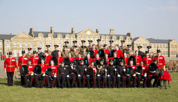 The Duke of Cambridge posing for the Officer's Mess group photo at the St Patrick's Day Parade with the Irish Guards