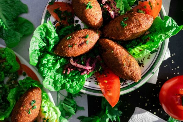 Kibbeh, deep-fried pounded bulgur wheat, pine nuts, lamb and spices